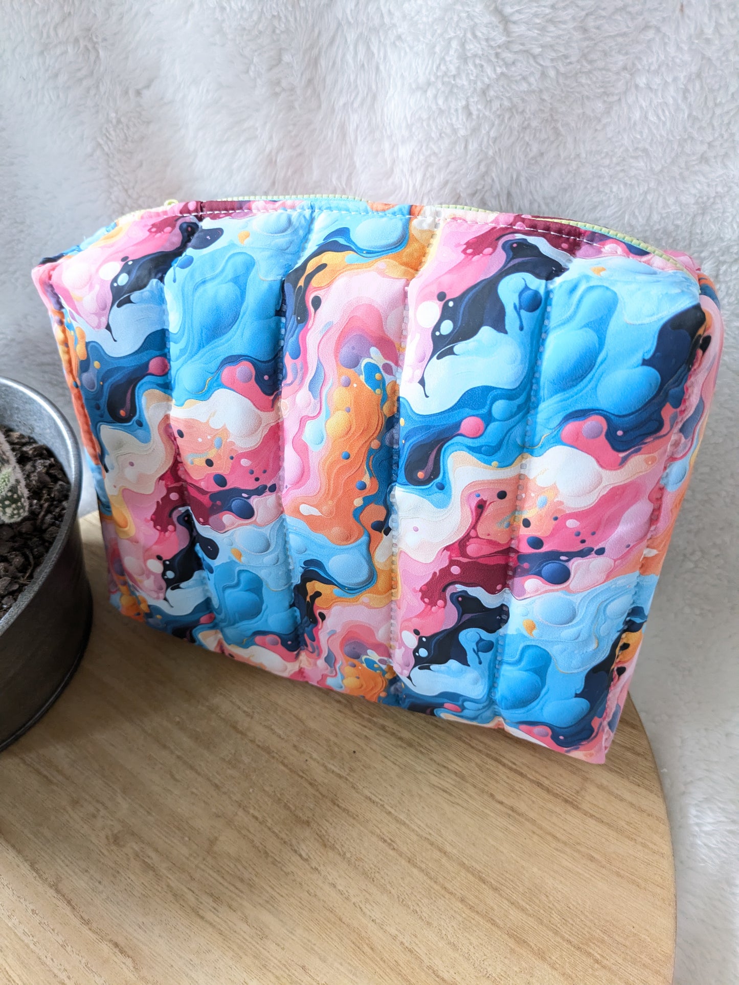 Trousse de toilette matelassée